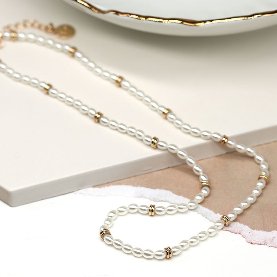 Seed pearl and golden spacer necklace