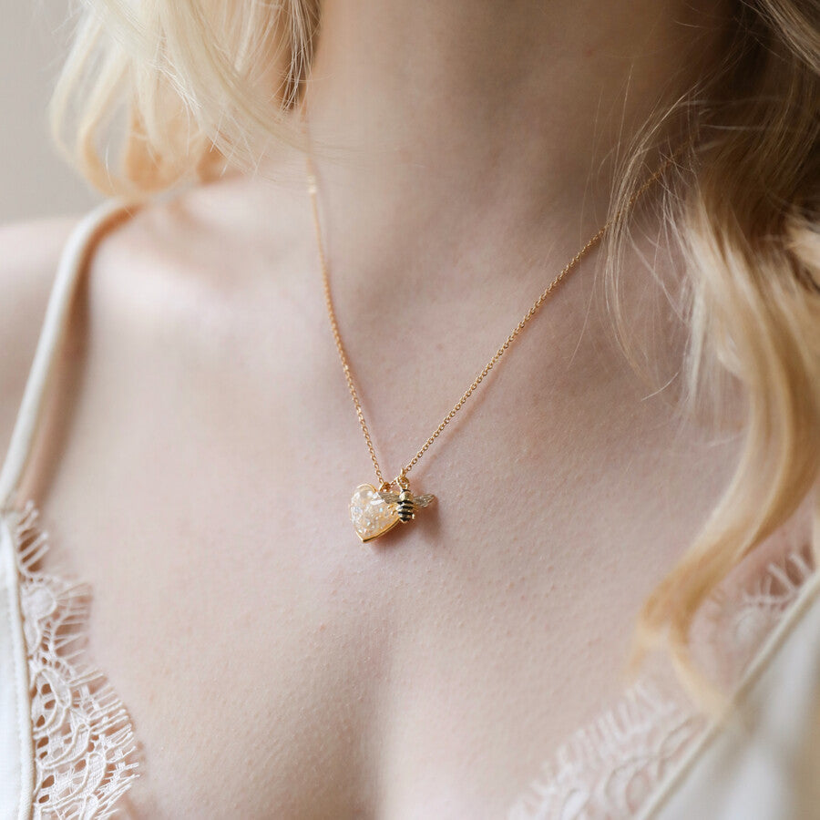 Shell heart and bee charm necklace in gold