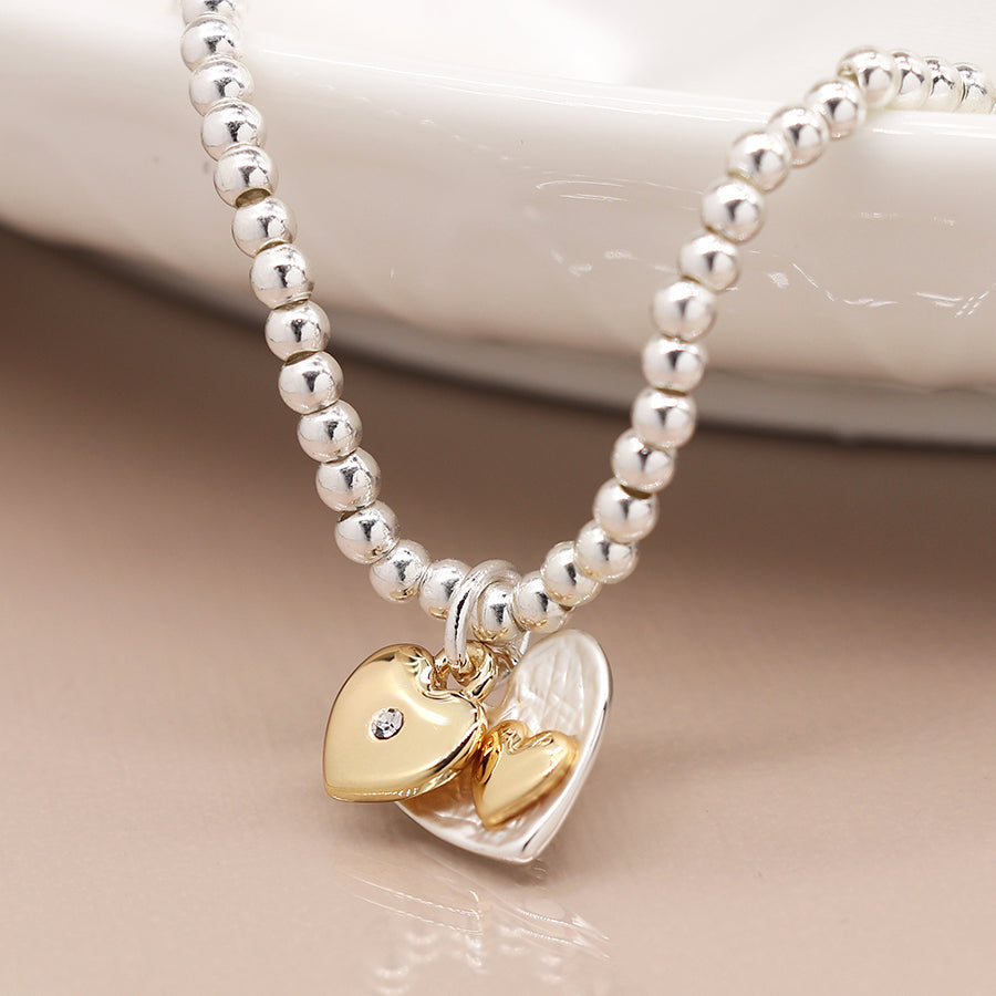 Silver and gold plated double heart bracelet