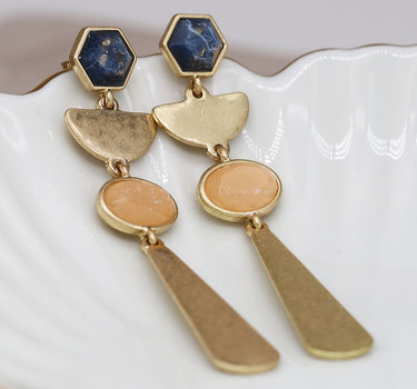 Golden worn finish geometric drop earrings look