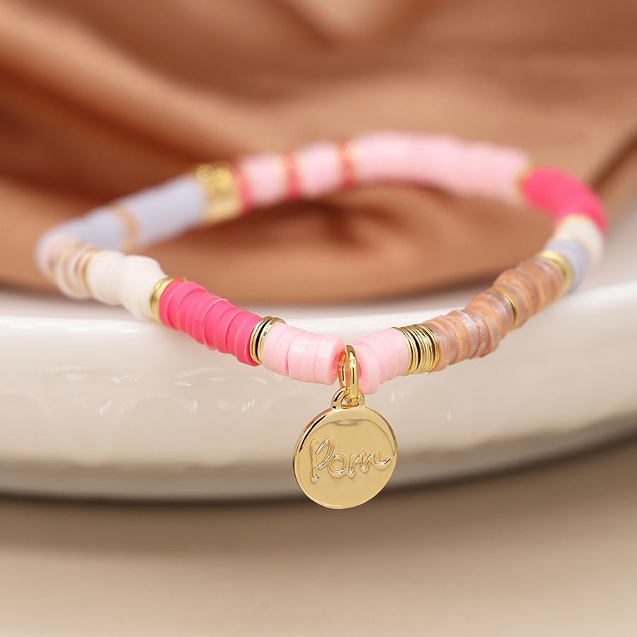 Sunny pink mix fimo bead and pom charm bracelet