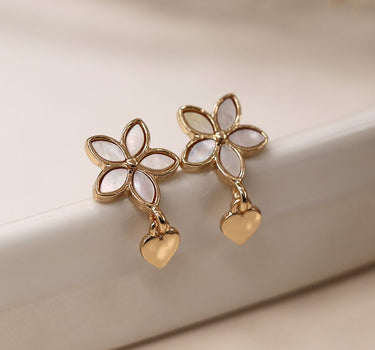 Golden shell inset flower and heart charm earrings
