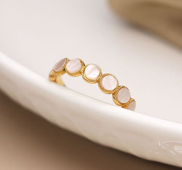 Gold plated ring with white shell circles – sml/med