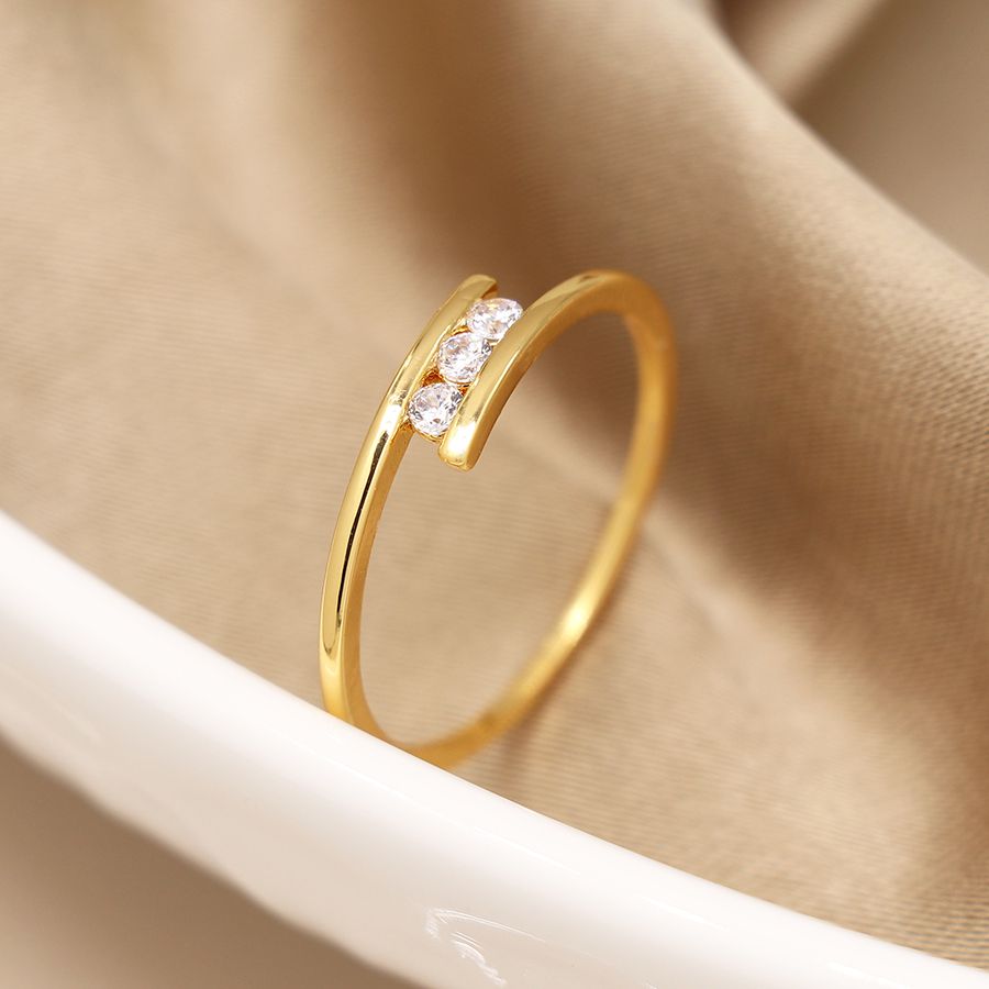 Gold plated fine twist ring with triple crystal detail - sml/med