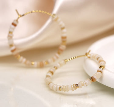 Seed pearl, bead and faux gold hoop and pebble earrings