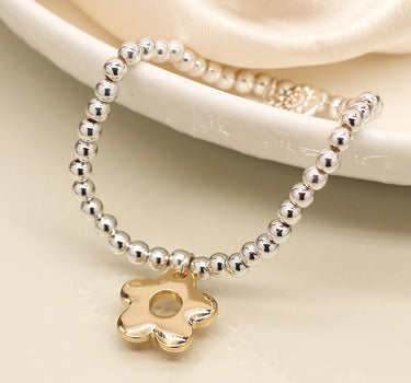 Silver plated and faux gold retro daisy charm bracelet