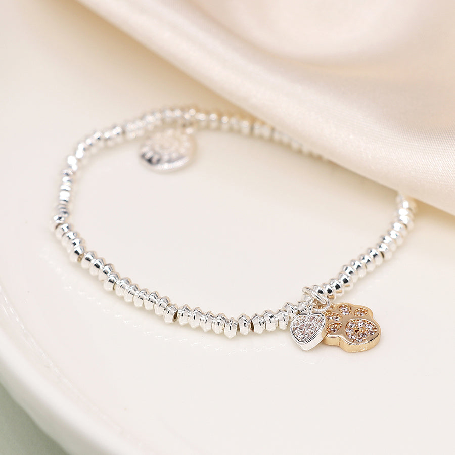 Silver plated crystal heart and golden paw charm bracelet