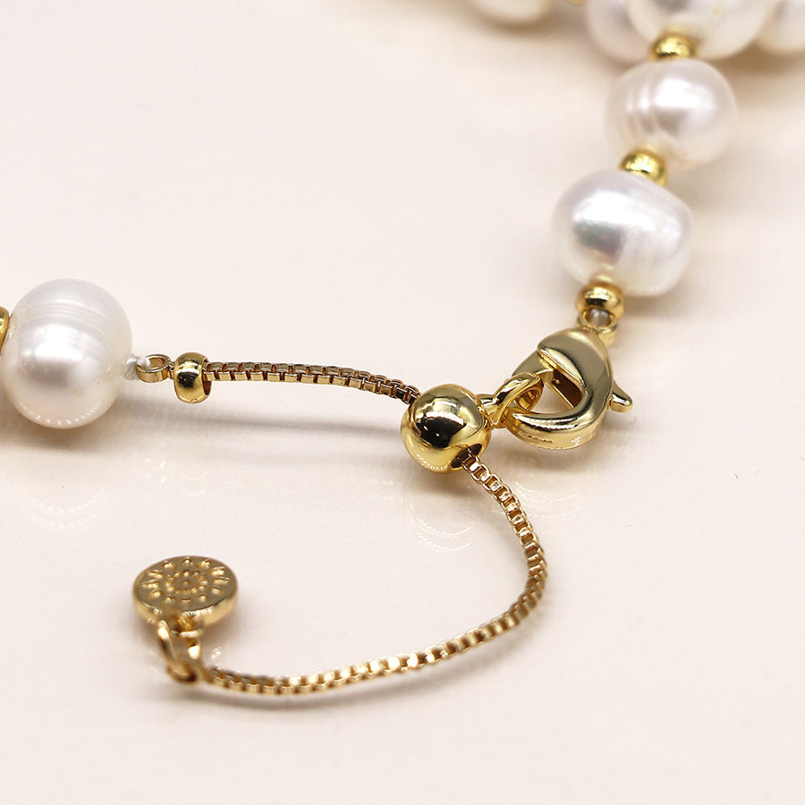 Ivory freshwater pearl and golden bead necklace