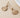 Golden worn disc drop earrings