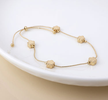 Faux gold flowers dainty station bracelet