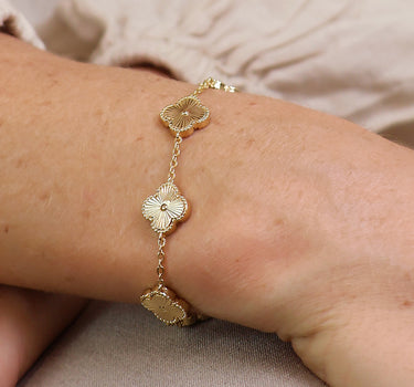 Faux gold plated quatrefoil station bracelet