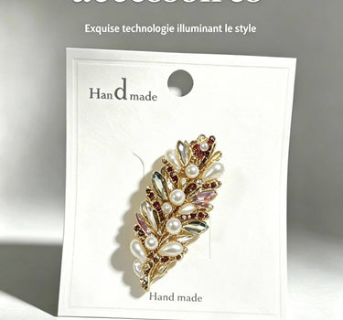 Pretty leaf-shaped brooch.