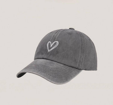 Washed denim-effect cap with heart motif
