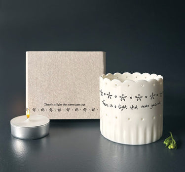 Scallop tea light holder-There is a light