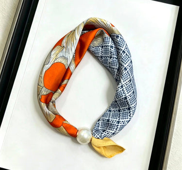 Satin scarf with magnetic pearl clasp