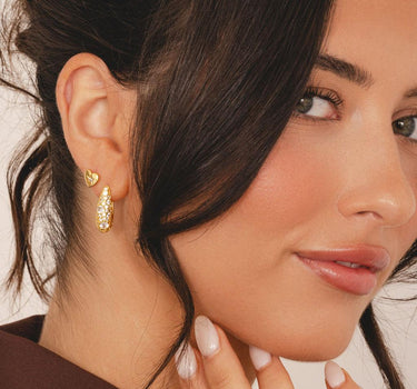 Chunky huggie hoop earrings in gold