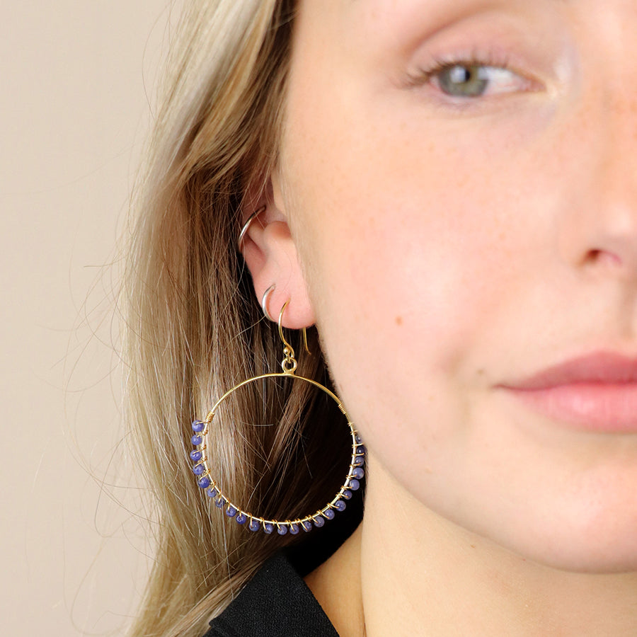 Gold plated hoop earrings with sodalite beads