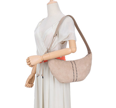 Curved suede bag with stud detail