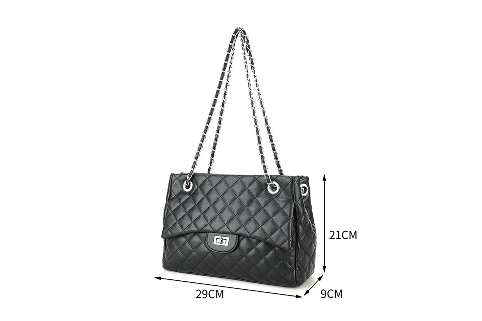 Quilted bag with silver hardware