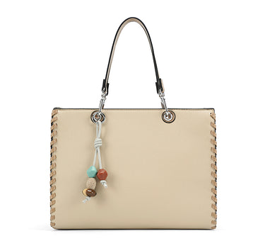 Shoulder bag with stitch detail and charms