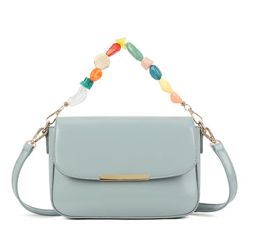 Bag with jewelled handle