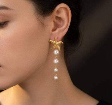Golden starfish earrings with stainless steel pearls