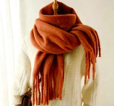 Solid scarf with large fringe