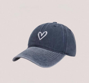 Washed denim-effect cap with heart motif