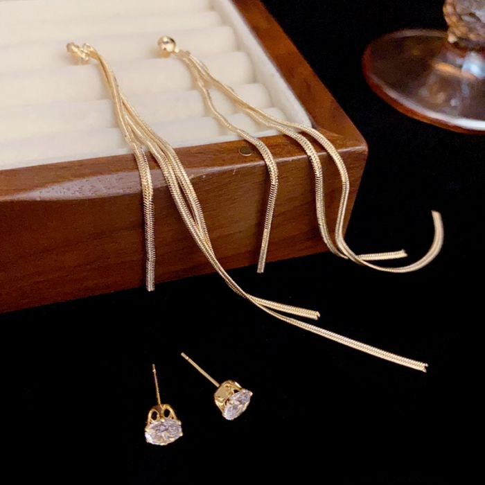 Long tassels earrings in Gold