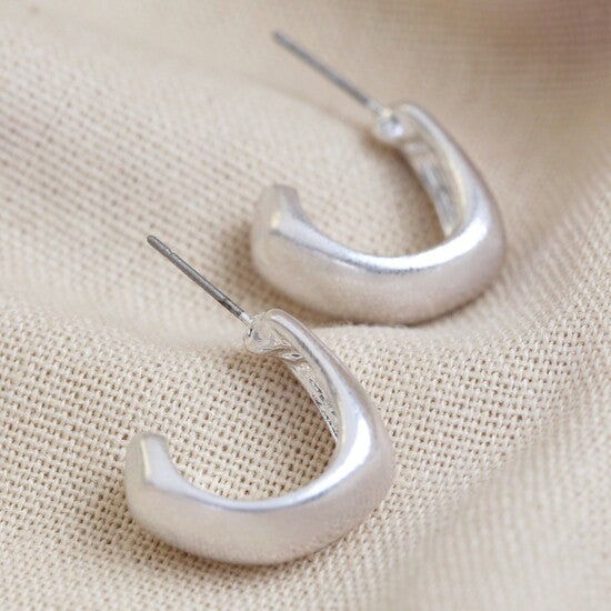 Wide irregular shape hoop earrings in silver