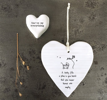 Wobbly round heart-A baby fills a place