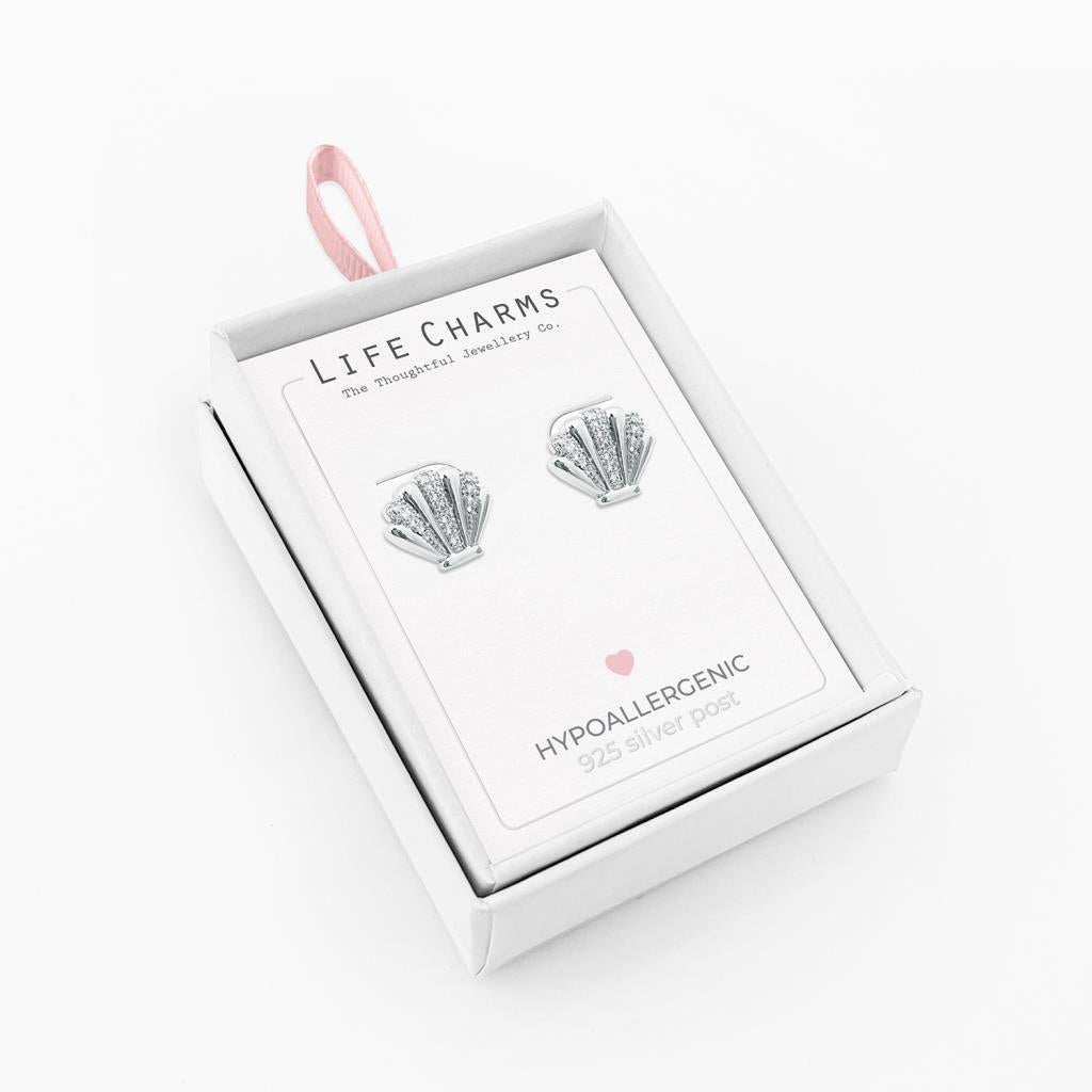 Silver seashell stud earrings